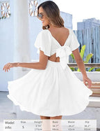 Amélie · Vestido corto con escote corazón, nudo y manga de vuelo