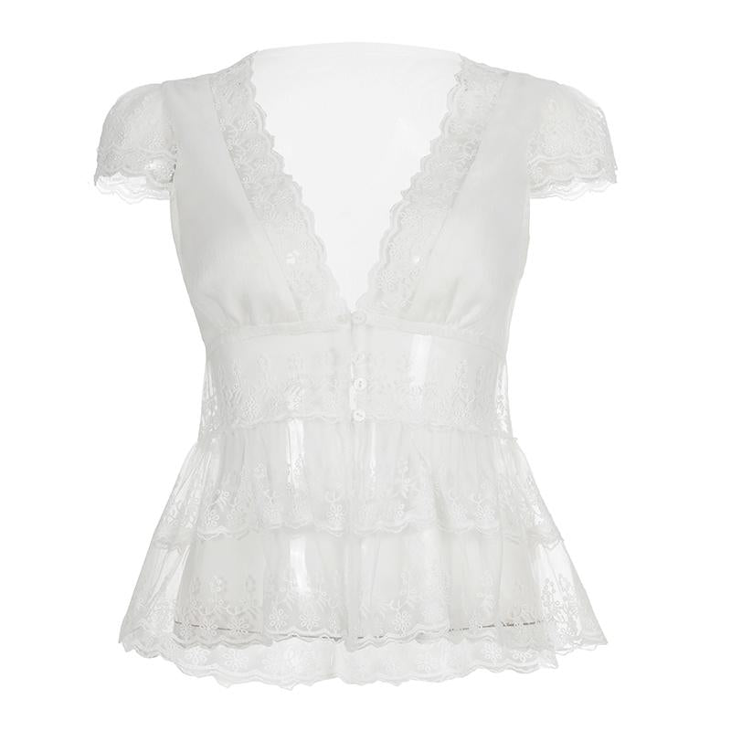 Amélie · Top peplum de encaje translúcido con escote pronunciado