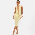 Amélie · Conjunto de top halter drapeado y pantalón capri