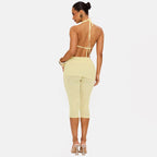 Amélie · Conjunto de top halter drapeado y pantalón capri