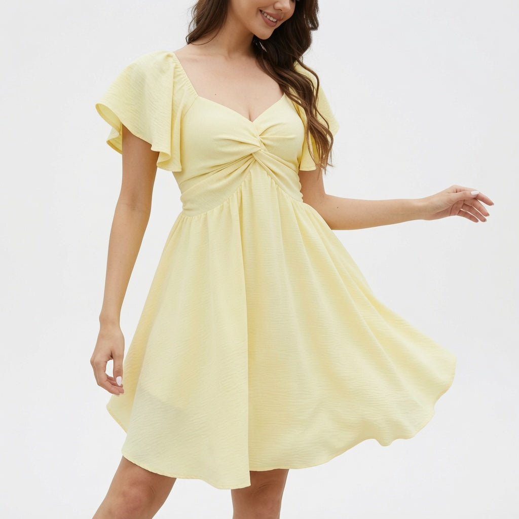 Amélie · Vestido corto con escote corazón, nudo y manga de vuelo