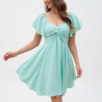 Amélie · Vestido corto con escote corazón, nudo y manga de vuelo