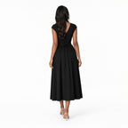 Amélie · Vestido midi con hombreras y lazada en la espalda