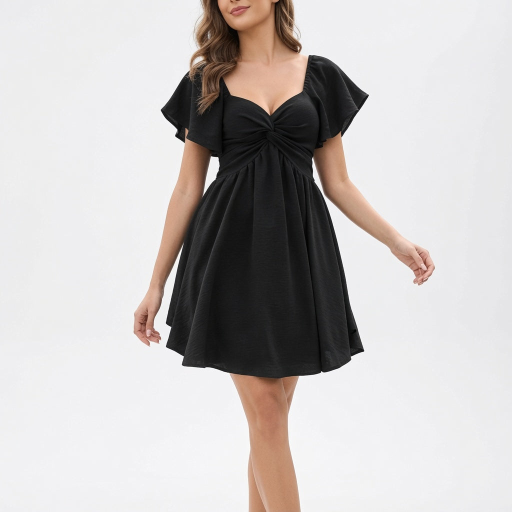 Amélie · Vestido corto con escote corazón, nudo y manga de vuelo