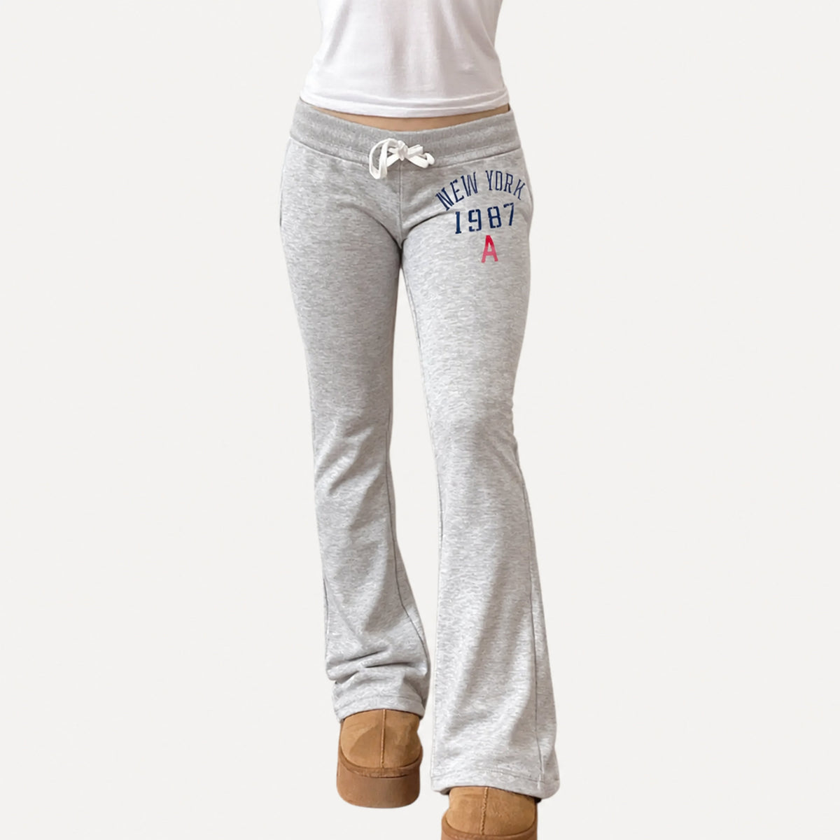 Amélie · Pantalón de campana de tiro bajo con cordón y estampado