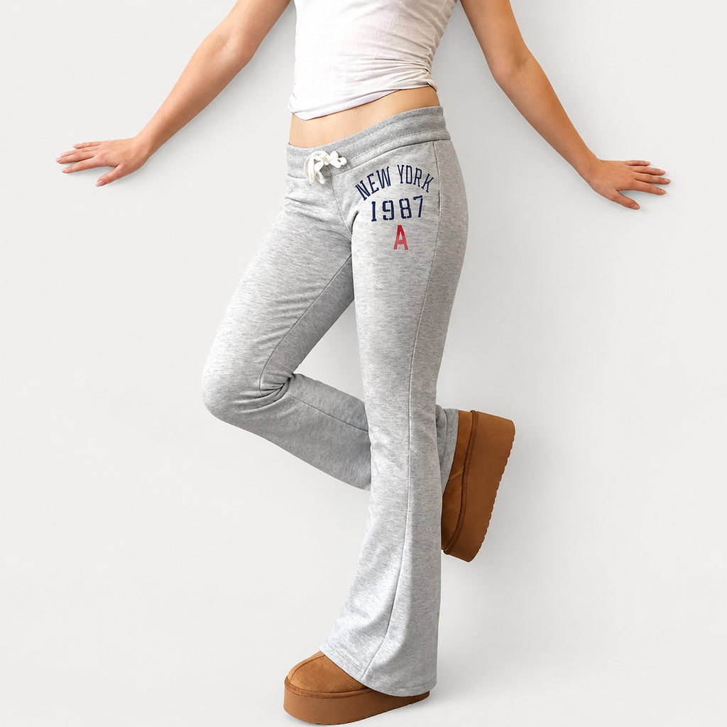 Amélie · Pantalón de campana de tiro bajo con cordón y estampado
