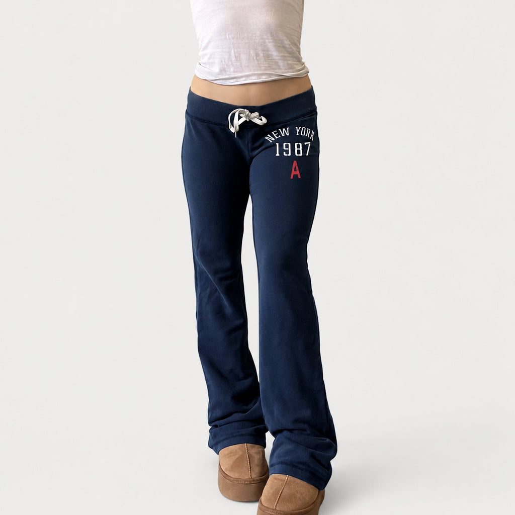Amélie · Pantalón de campana de tiro bajo con cordón y estampado