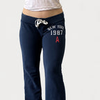 Amélie · Pantalón de campana de tiro bajo con cordón y estampado