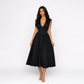 Amélie · Vestido midi con hombreras y lazada en la espalda