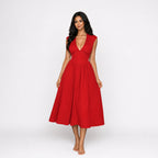 Amélie · Vestido midi con hombreras y lazada en la espalda