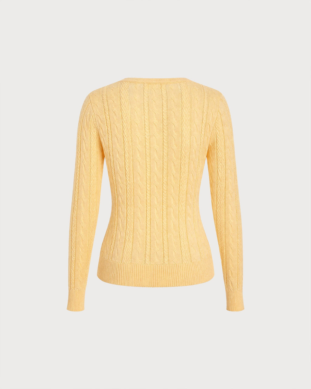 Jersey de punto amarillo texturizado con cuello redondo