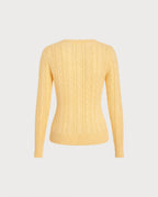 Jersey de punto amarillo texturizado con cuello redondo