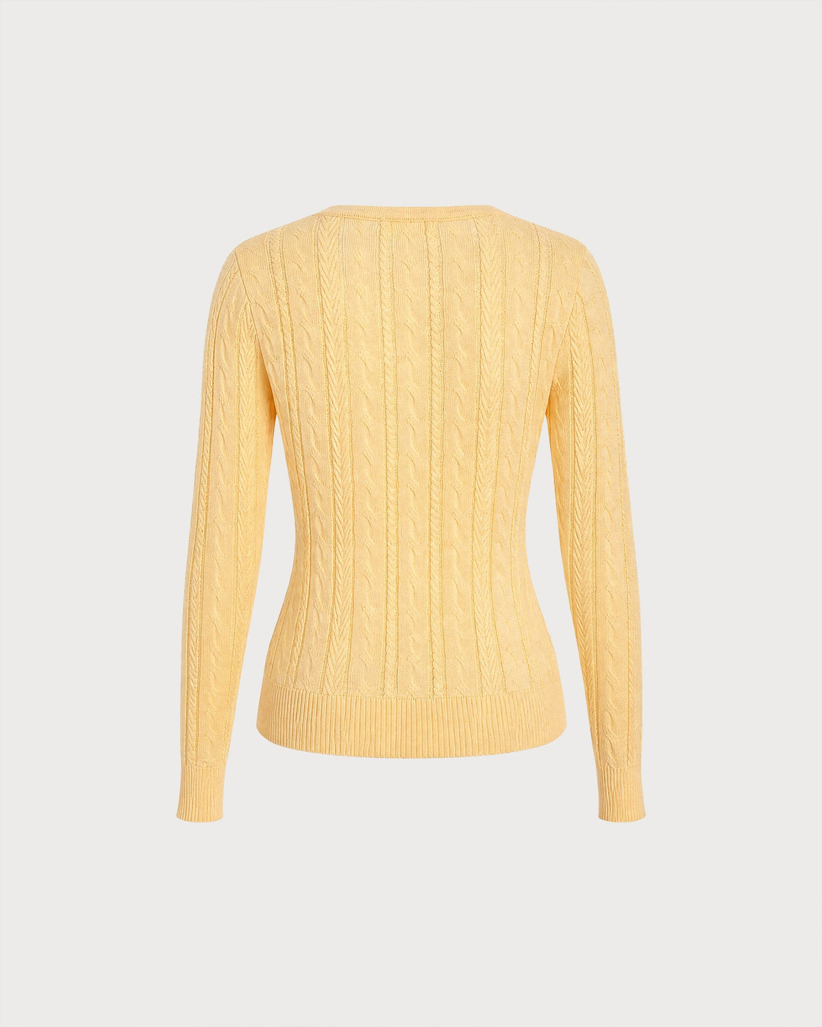 Jersey de punto amarillo texturizado con cuello redondo