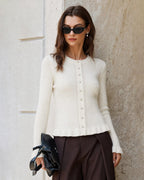 Chaqueta de punto blanco roto con botonadura sencilla