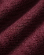 Chaqueta de punto burdeos con cuello redondo y botones