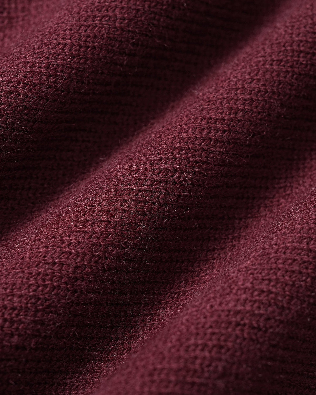 Chaqueta de punto burdeos con cuello redondo y botones