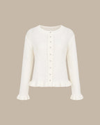 Chaqueta de punto blanco roto con botonadura sencilla