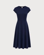 Amélie · Vestido midi azul marino de línea A con espalda descubierta y abertura
