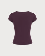 Camiseta morada de encaje con escote en V y lazo