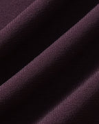 Camiseta morada de encaje con escote en V y lazo