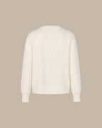 Chaqueta de punto blanco roto con cuello redondo y botones