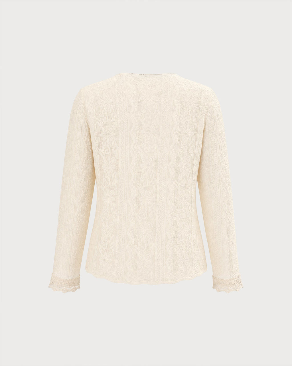 Chaqueta de punto albaricoque de flores con escote en V