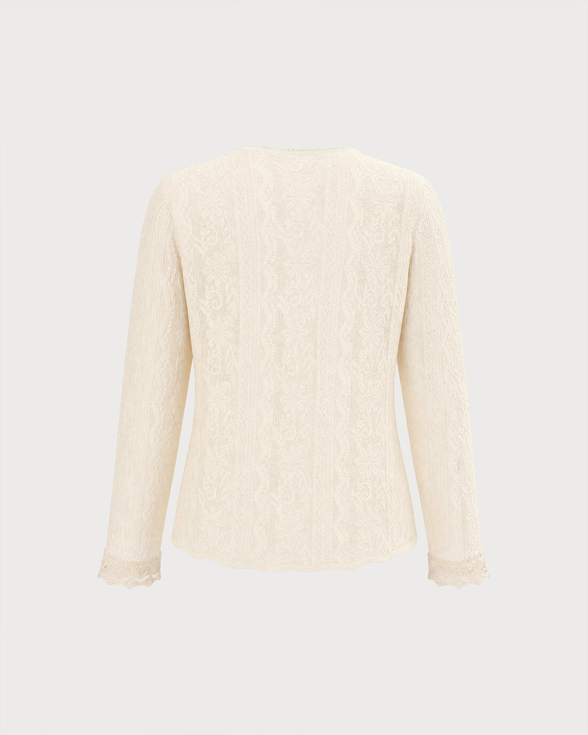 Chaqueta de punto albaricoque de flores con escote en V