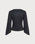 Camiseta de punto negra de lunares con escote en V