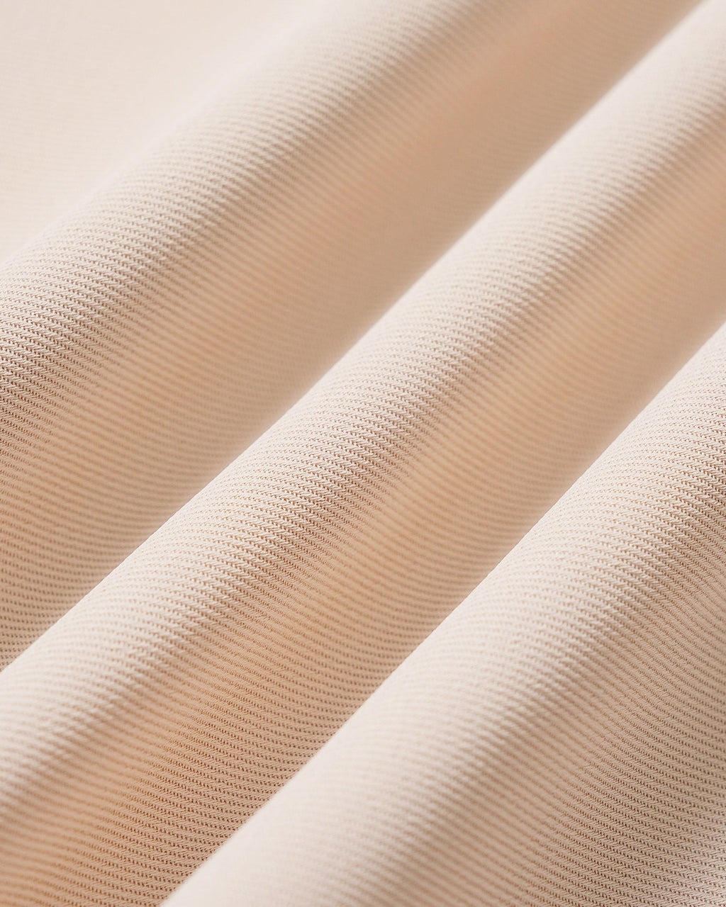 Pantalón recto albaricoque con botones y bolsillos