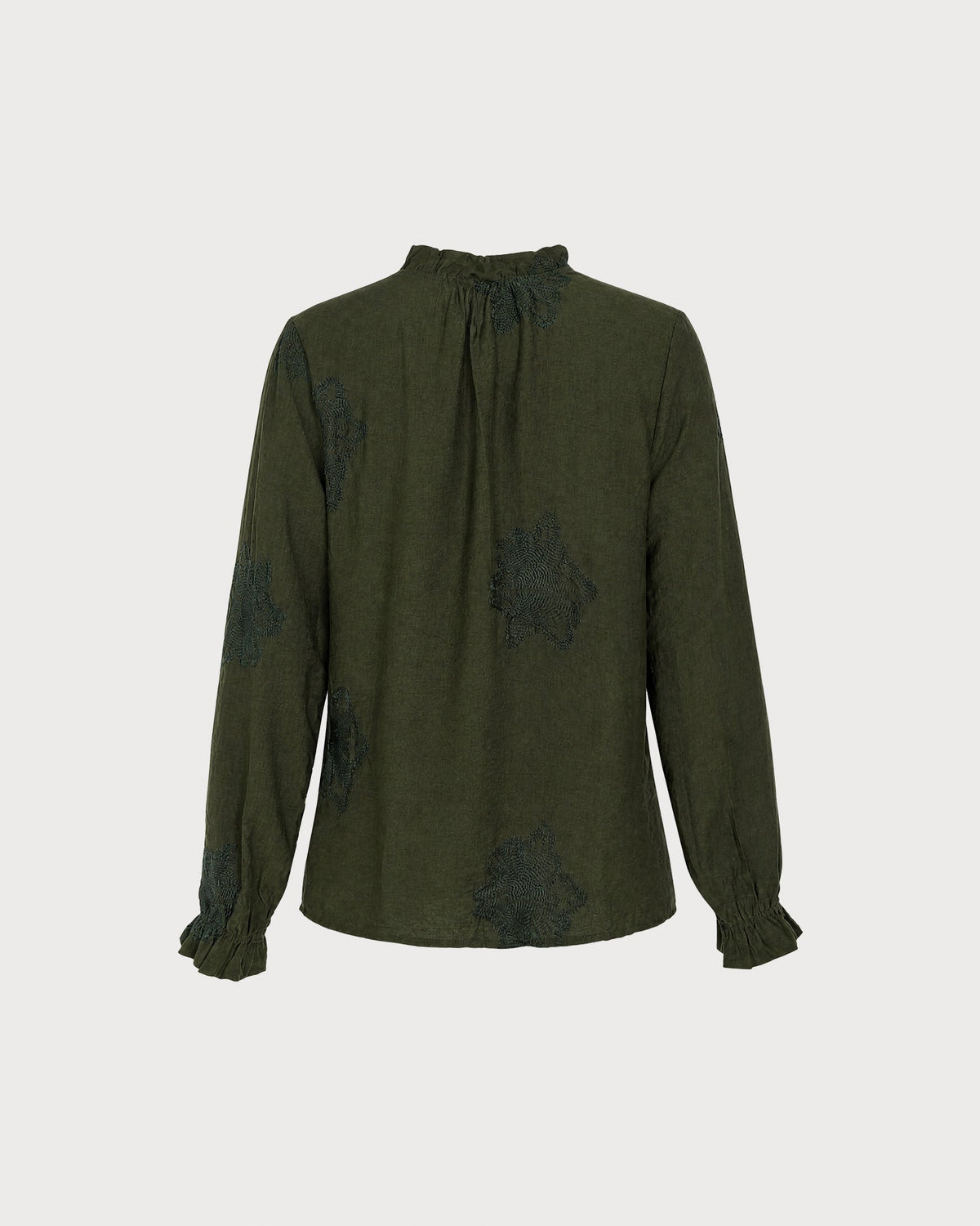 Camisa verde bordada con volantes y botones