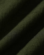 Camisa verde bordada con volantes y botones