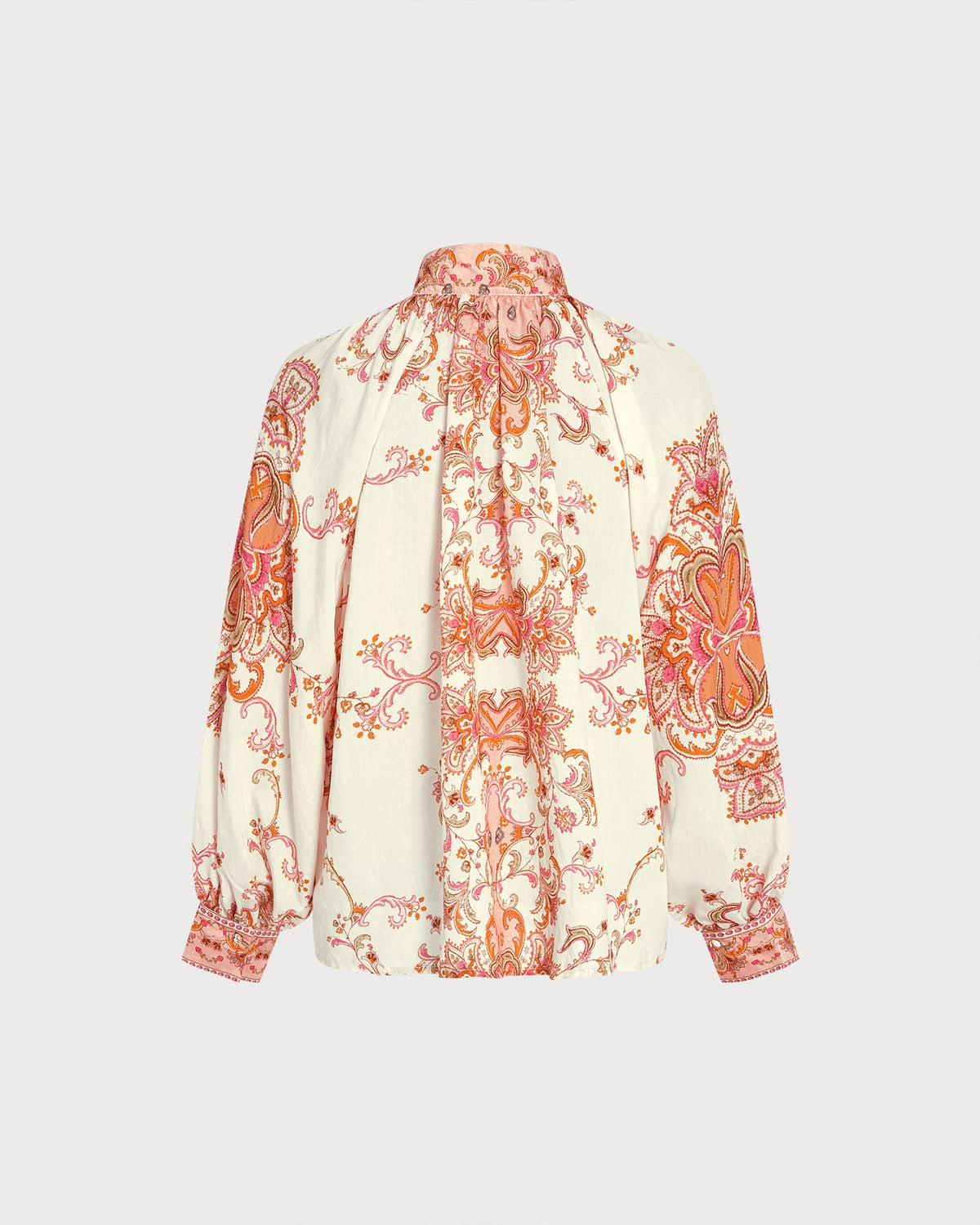 Camisa albaricoque de flores con cuello alto y botones