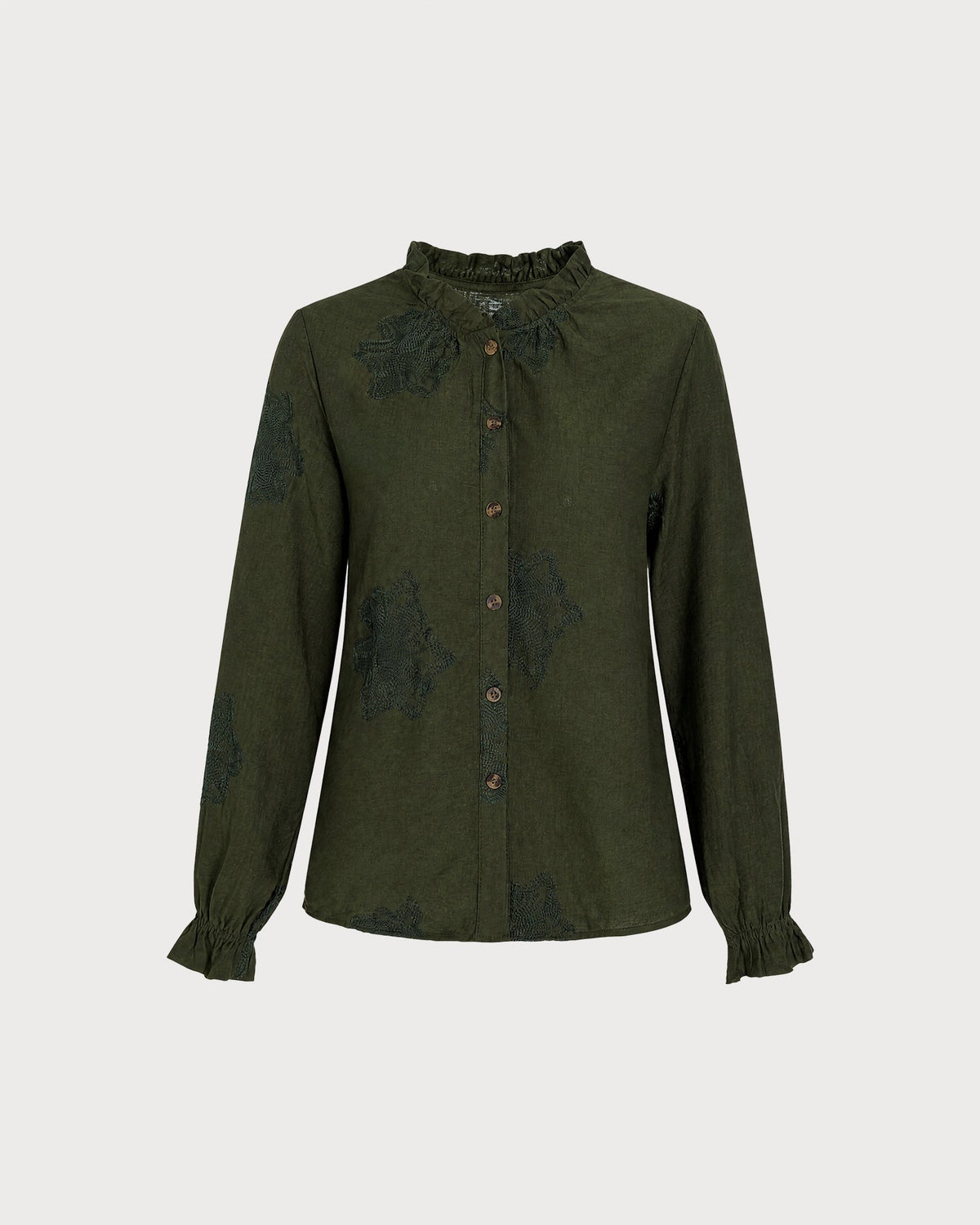 Camisa verde bordada con volantes y botones