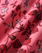 Falda corta rosa de flores con cintura elástica