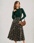 Falda midi verde plisada de flores con abertura
