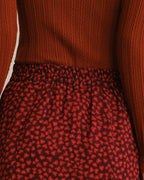 Falda midi roja de gasa con flores y cintura elástica