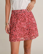 Falda corta rosa de flores con cintura elástica