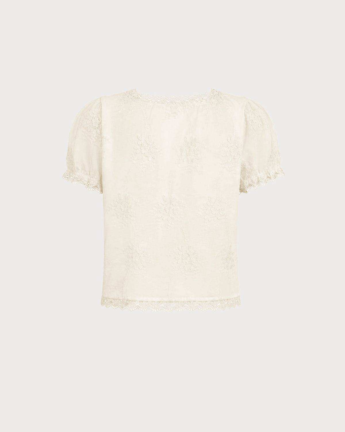 Camiseta albaricoque de flores con escote cuadrado y botones