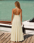 Vestido de playa amarillo fruncido con espalda descubierta