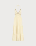 Vestido de playa amarillo fruncido con espalda descubierta