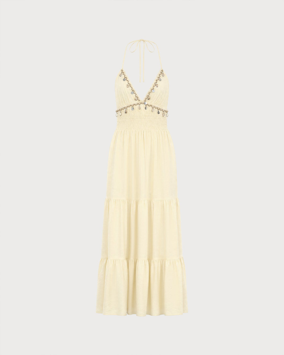 Vestido de playa amarillo fruncido con espalda descubierta